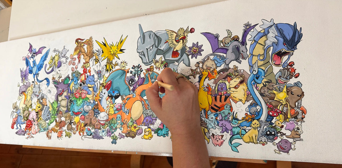 Alex painting the next Pokémon onto the 151 canvas