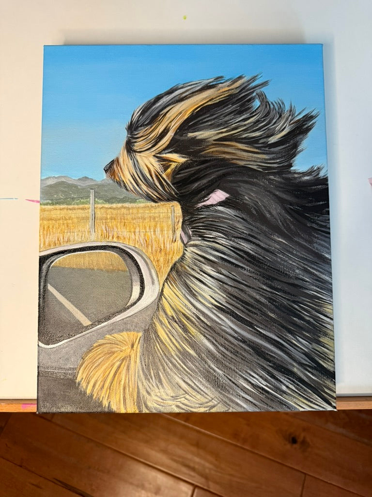 A long-haired dog with its head out of a car window, hand-painted on canvas